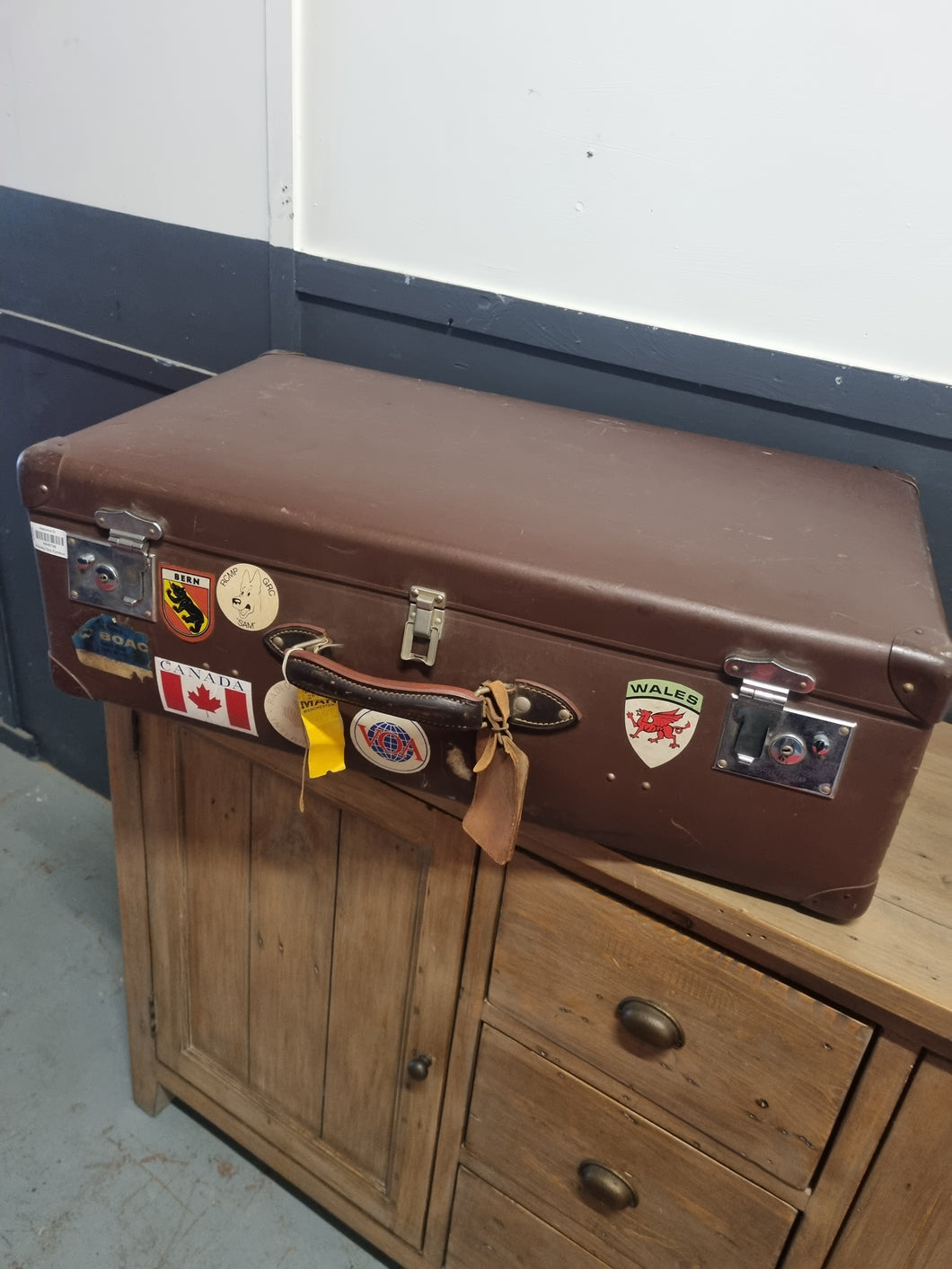 Leather suitcase with stickers