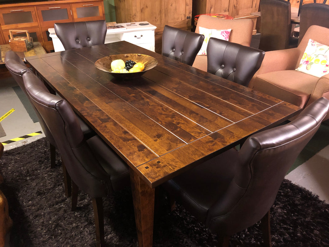 Dark wood table with 8 leather back button chairs