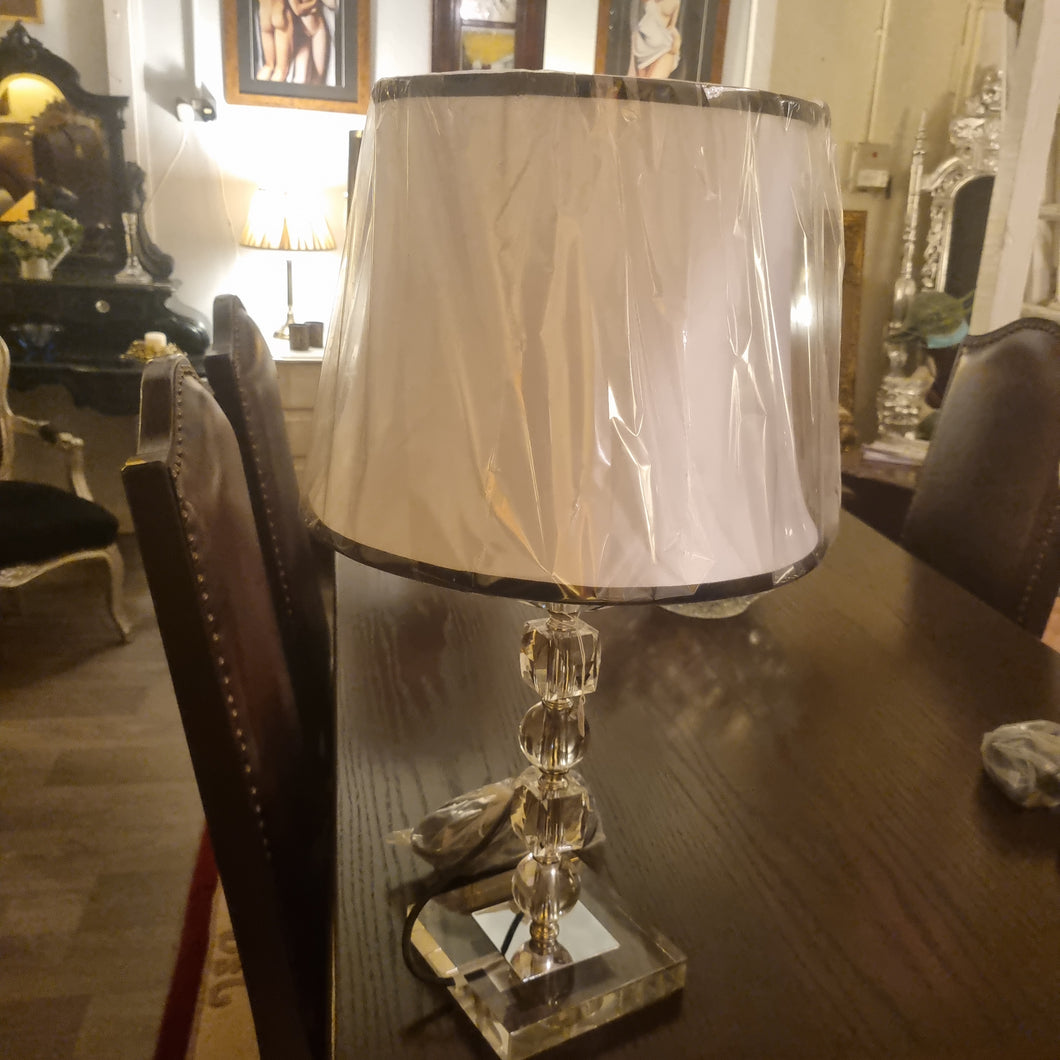 Lamp with cream shade black trim