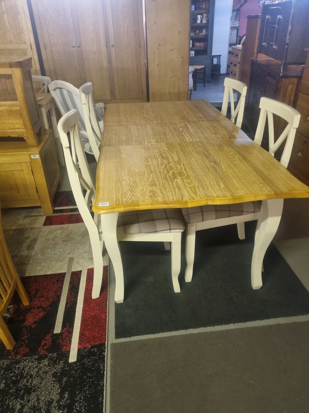 Oak extending dining table & four chairs
