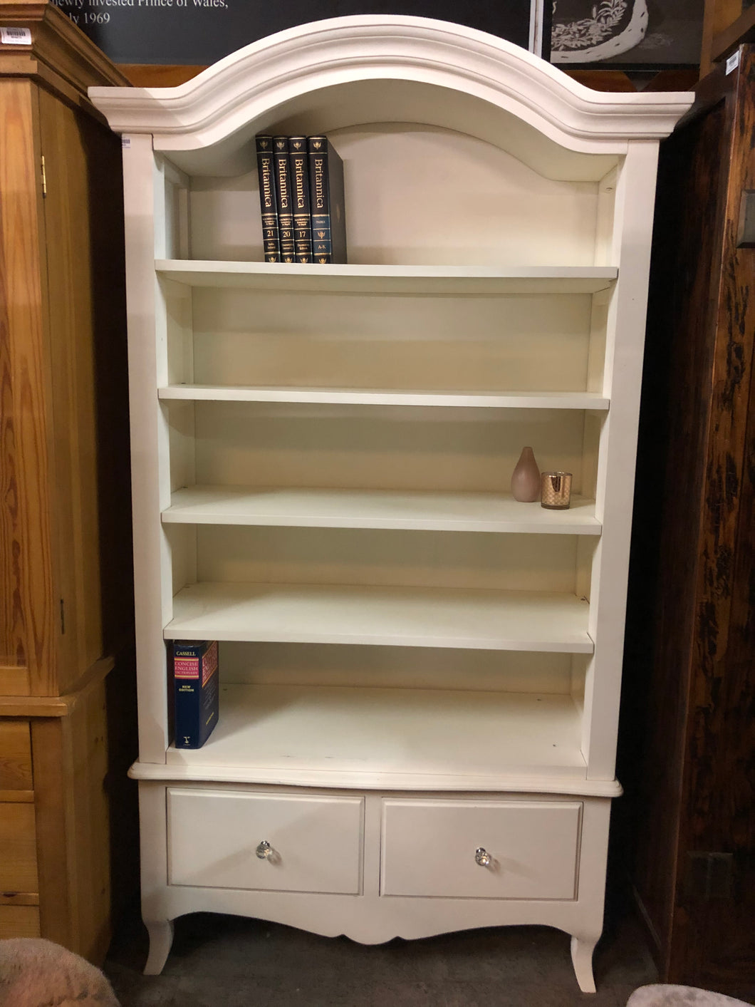White bookcase with crystal knobs