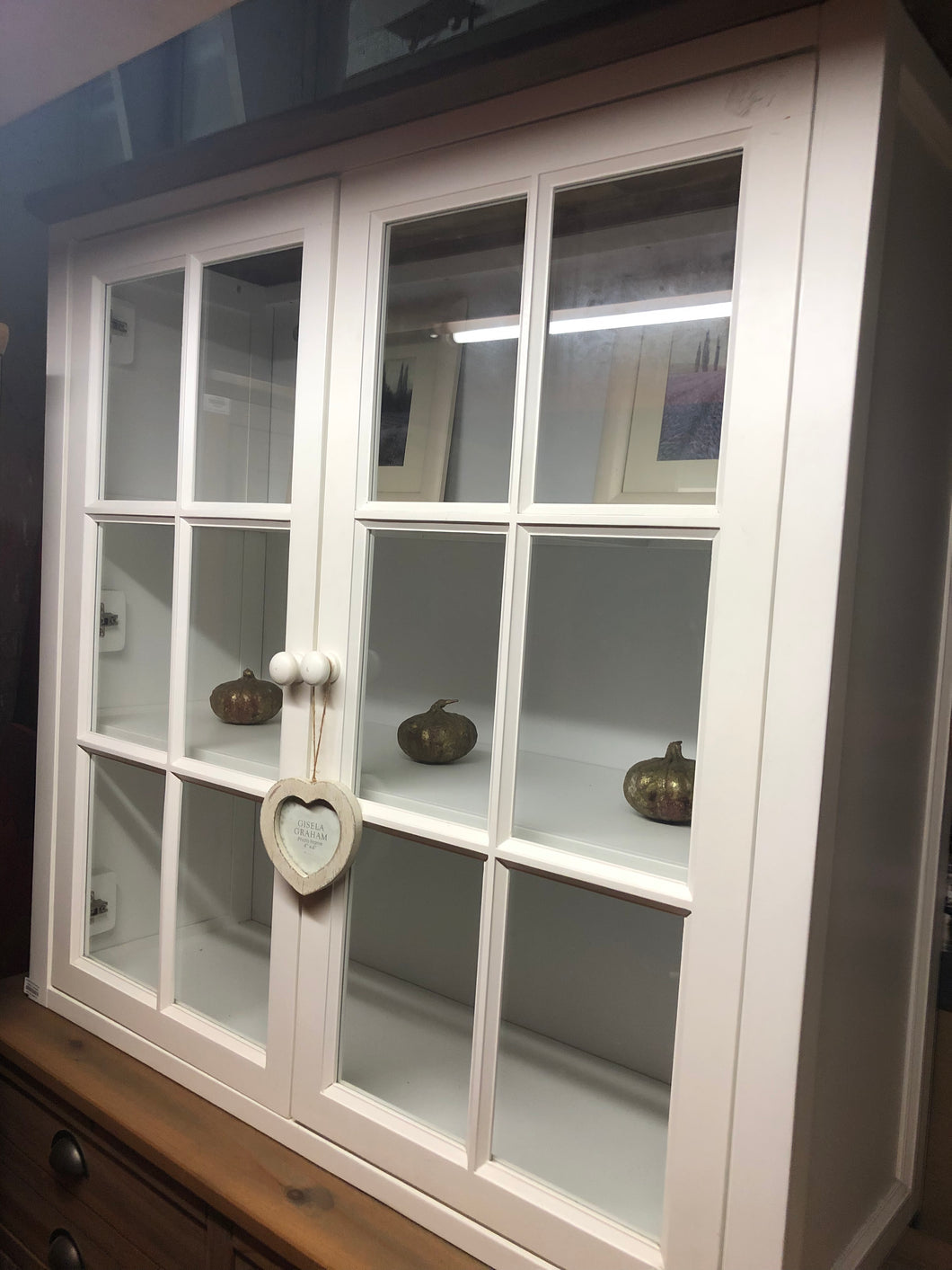 Glass fronted white cabinet